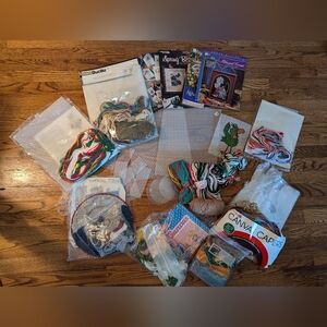 Mixed lot of plastic canvas blank sheets, yarn pattern books